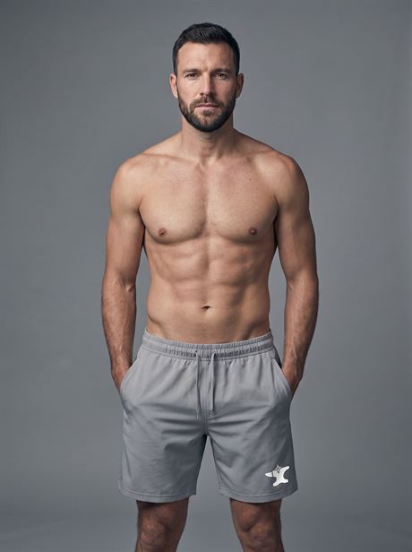 Grey sports shorts, front view — AI-generated product photo, same male model, frame 6 of 25