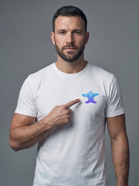 White cotton T-shirt, model pointing at the chest print — AI-generated product photo, same male model, frame 9 of 25