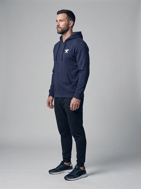 Navy zip-up hoodie, full-length side view — AI-generated product photo, same male model, frame 18 of 25