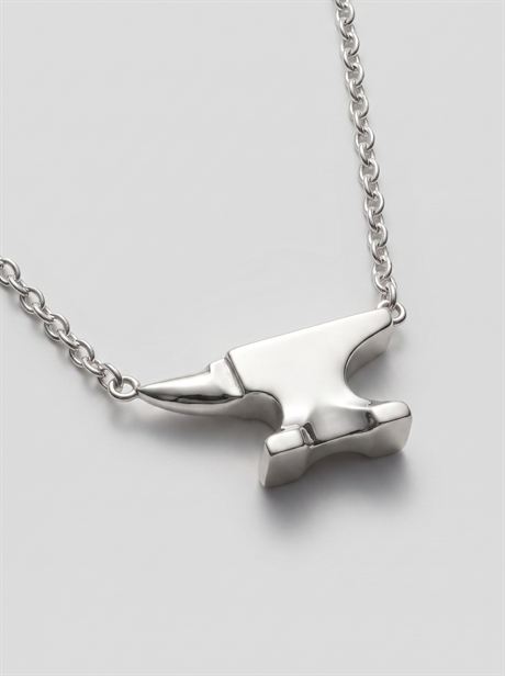 Silver anvil pendant on a chain, angled close-up — AI-generated product photo, nobody in the frame, frame 7 of 25