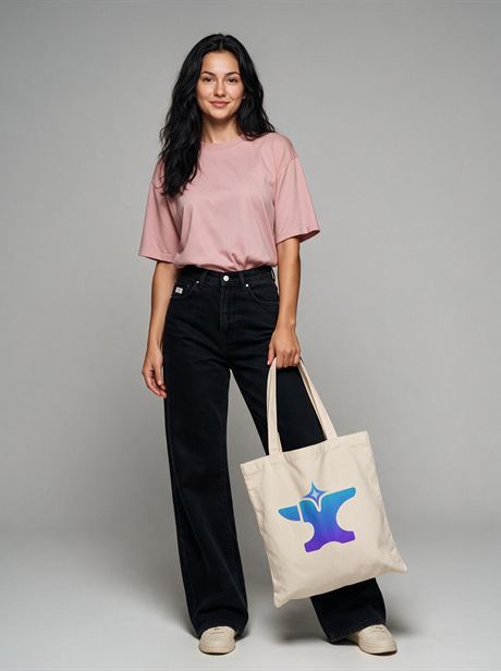 Canvas tote bag carried by hand, with a pink T-shirt and black jeans — AI-generated product photo, same female model, frame 1 of 25