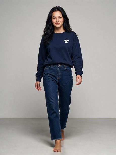 Navy sweatshirt with jeans, full-length walking shot — AI-generated product photo, same female model, frame 10 of 25
