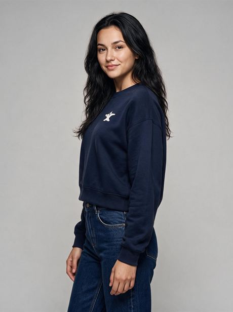 Navy sweatshirt with jeans, full-length side view — AI-generated product photo, same female model, frame 14 of 25